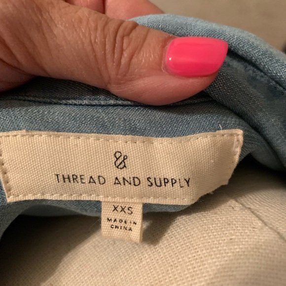 Chambray button-down sleeveless top with a frayed him - Picture 3 of 3